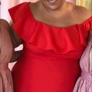 The red off the shoulder dress